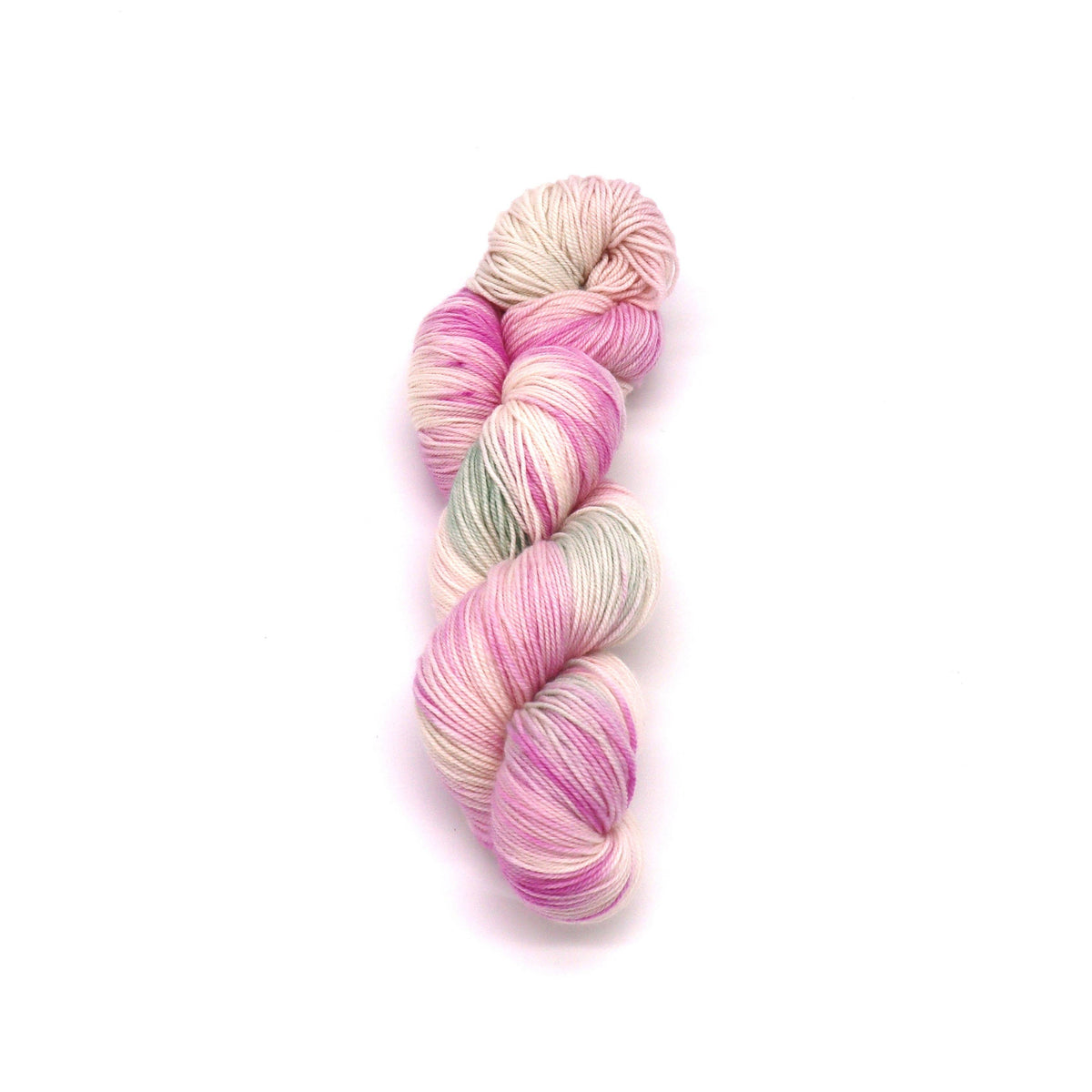 Handgefärbtes Merinogarn mit Farbverlauf in Rosa, Beige und hellem Grau