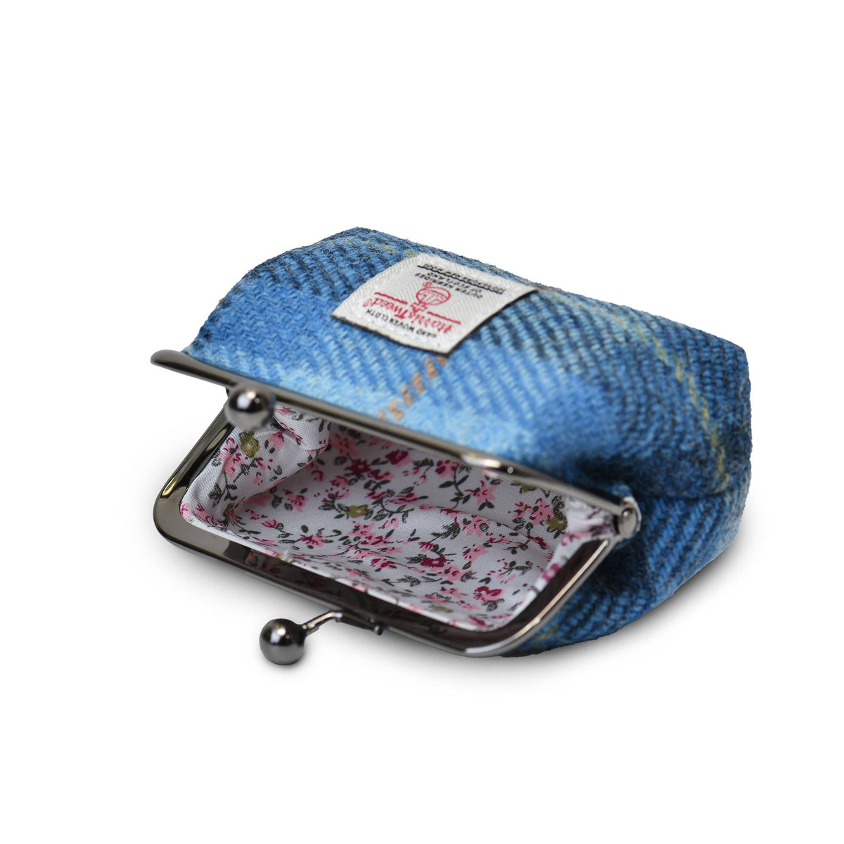 Münzbörse aus Harris Tweed® mit Bügelverschluss, geöffnetes Innenfach mit Blumenfutter